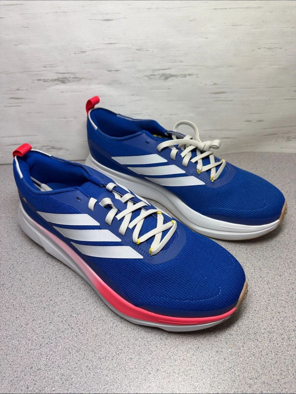 adidas Men’s Blue Athletic Sneakers with White Stripes and Pink Accent